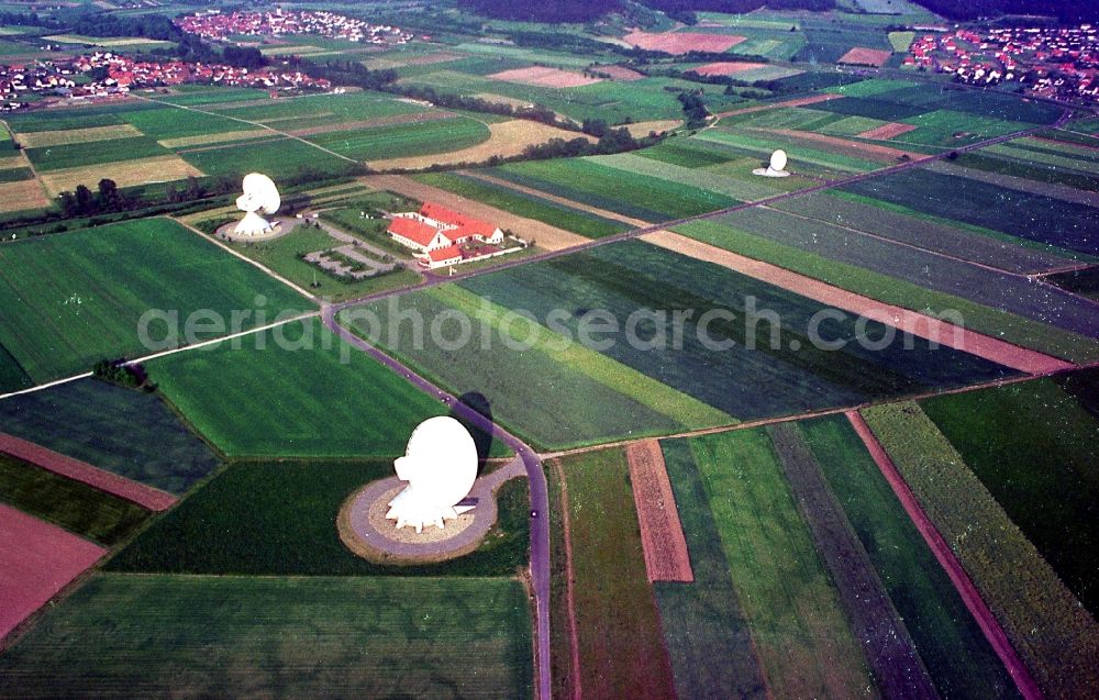 Fuchsstadt from the bird's eye view: Parbola antennas in the form of white satellite dishes on the site of the earth station in Fuchsstadt in the state Bavaria, Germany