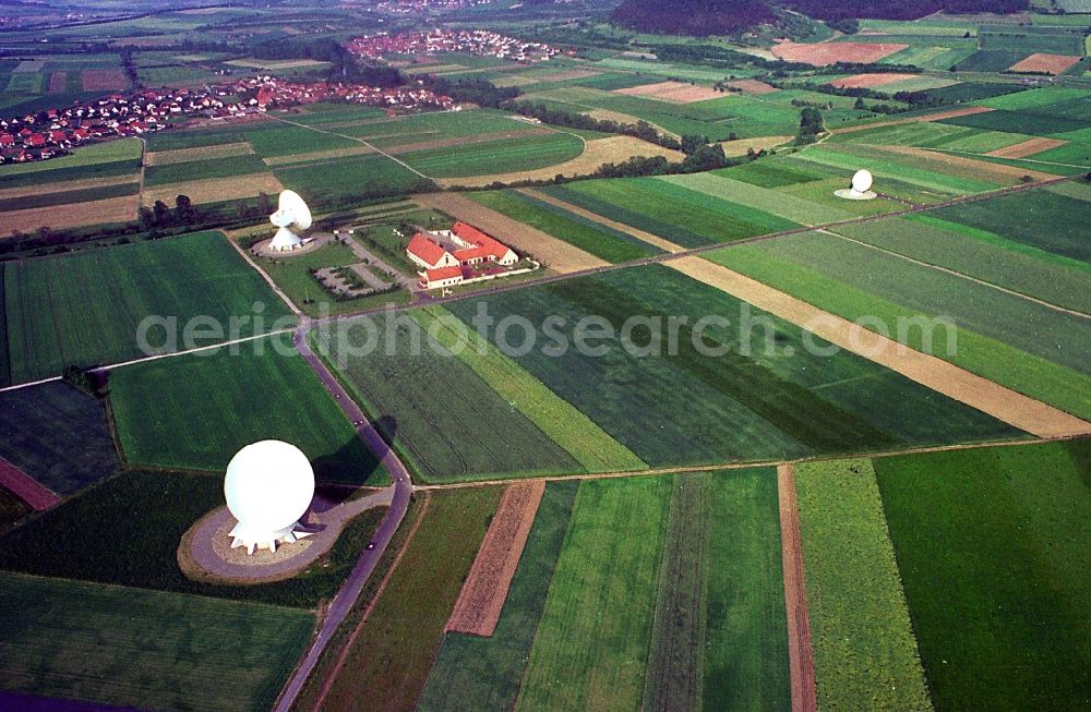 Aerial image Fuchsstadt - Parbola antennas in the form of white satellite dishes on the site of the earth station in Fuchsstadt in the state Bavaria, Germany