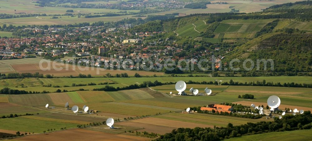 Fuchsstadt from the bird's eye view: Parbola antennas in the form of white satellite dishes on the site of the earth station in Fuchsstadt in the state Bavaria, Germany