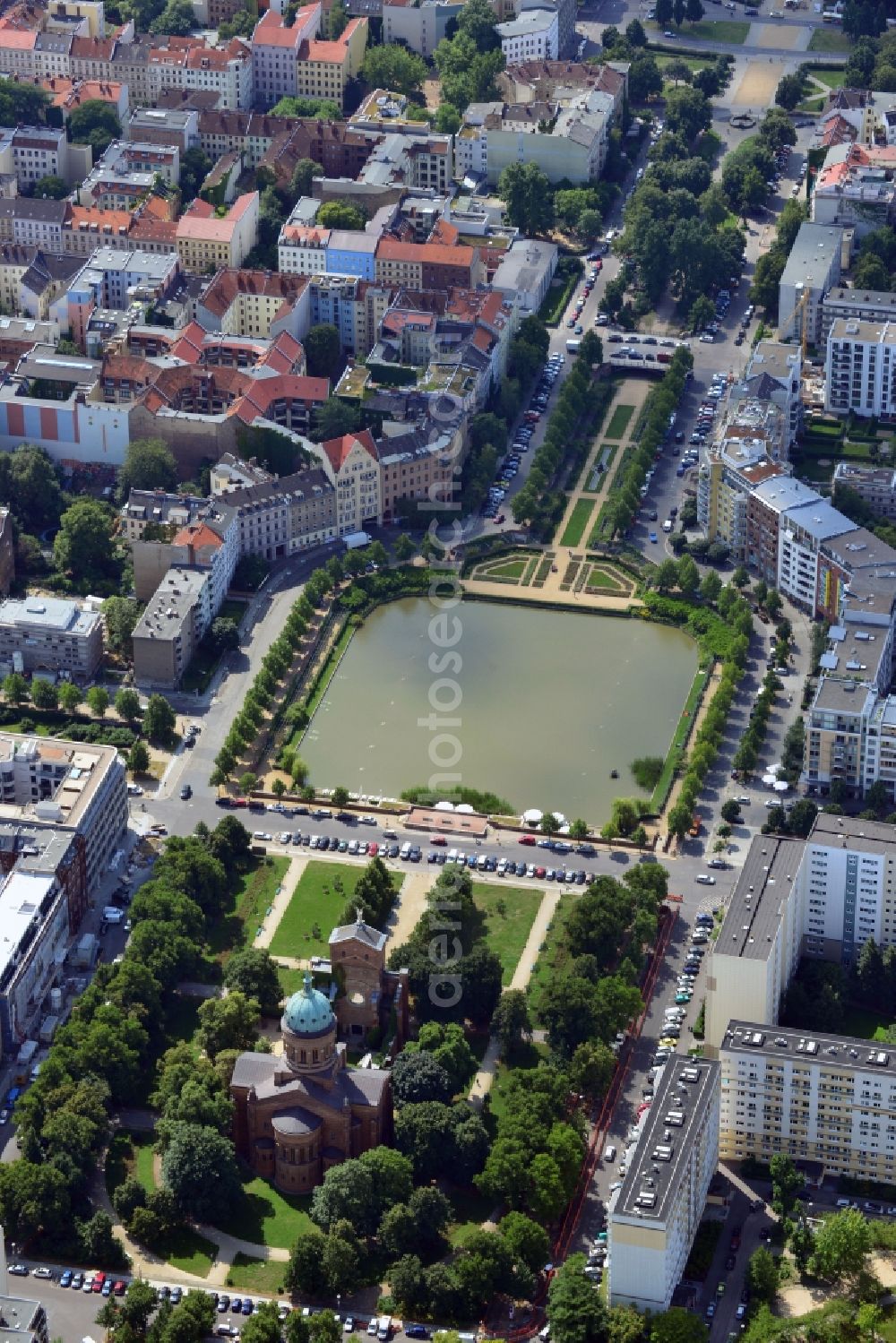 Berlin from above - View of the Angel's Basin in Kreuzberg. The angel is on the bottom of the pool Luisenstädtischer channel ahead of Michael's Church, between Leuschnerdamm and Legiendamm. Until 1989 it was filled with debris of war. Today it is an urban park with rose garden