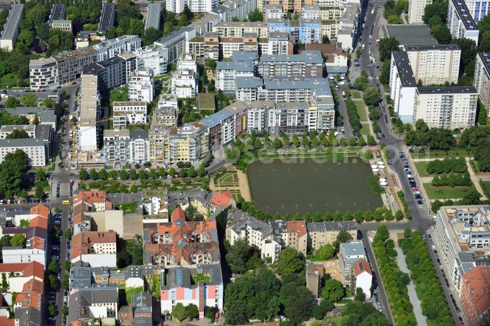 Berlin from the bird's eye view: View of the Angel's Basin in Kreuzberg. The angel is on the bottom of the pool Luisenstädtischer channel ahead of Michael's Church, between Leuschnerdamm and Legiendamm. Until 1989 it was filled with debris of war. Today it is an urban park with rose garden