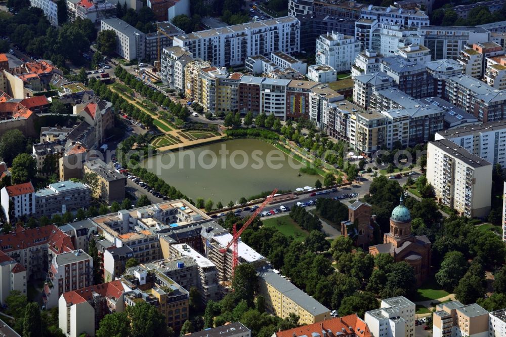 Berlin from the bird's eye view: View of the Angel's Basin in Kreuzberg. The angel is on the bottom of the pool Luisenstädtischer channel ahead of Michael's Church, between Leuschnerdamm and Legiendamm. Until 1989 it was filled with debris of war. Today it is an urban park with rose garden