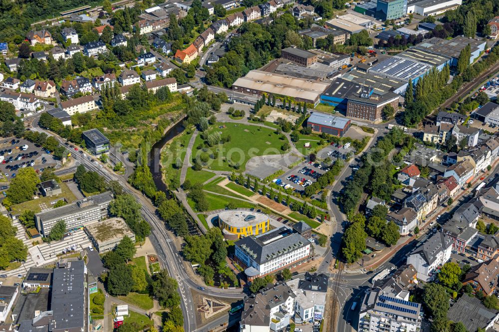 Gevelsberg from the bird's eye view: Park Ennepe-Strand at Jahnstreet 15 with Cafe, skate park, basketball court, football field, playground, parking spot, shore and the Stadtsparkasse Gevelsberg in Gevelsberg in the state North Rhine-Westphalia