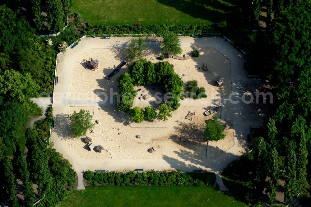 Berlin from above - Park with playground with sandy areas am Klausenerplatz in Berlin in Germany