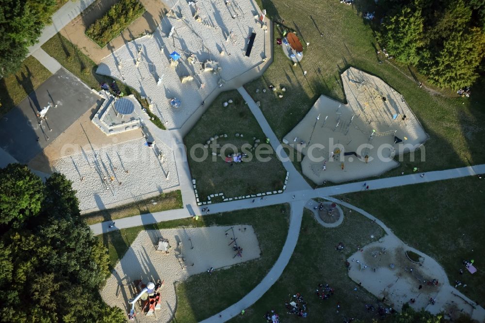 Berlin from the bird's eye view: Park with playground with sandy areas in Park am Buschkrug in Berlin