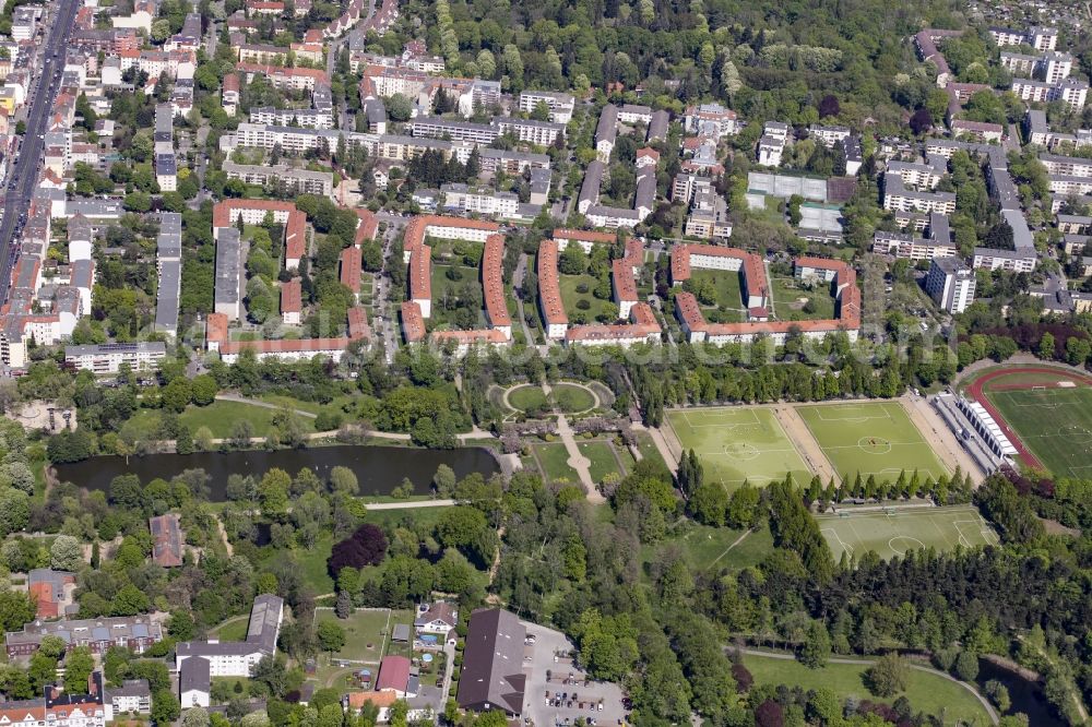 Aerial photograph Berlin - Park of Volkspark Mariendorf with Bluemelteich pond in the district of Tempelhof-Schoeneberg in Berlin, Germany. The park includes several ponds, sports and football facilities and pitches such as the football stadium Volksparkstadion and a rose garden