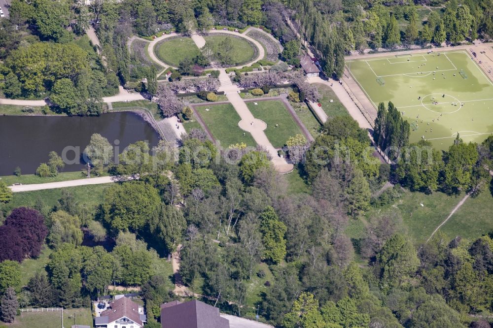 Berlin from above - Park of Volkspark Mariendorf with Bluemelteich pond in the district of Tempelhof-Schoeneberg in Berlin, Germany. The park includes several ponds, sports and football facilities and pitches such as the football stadium Volksparkstadion and a rose garden