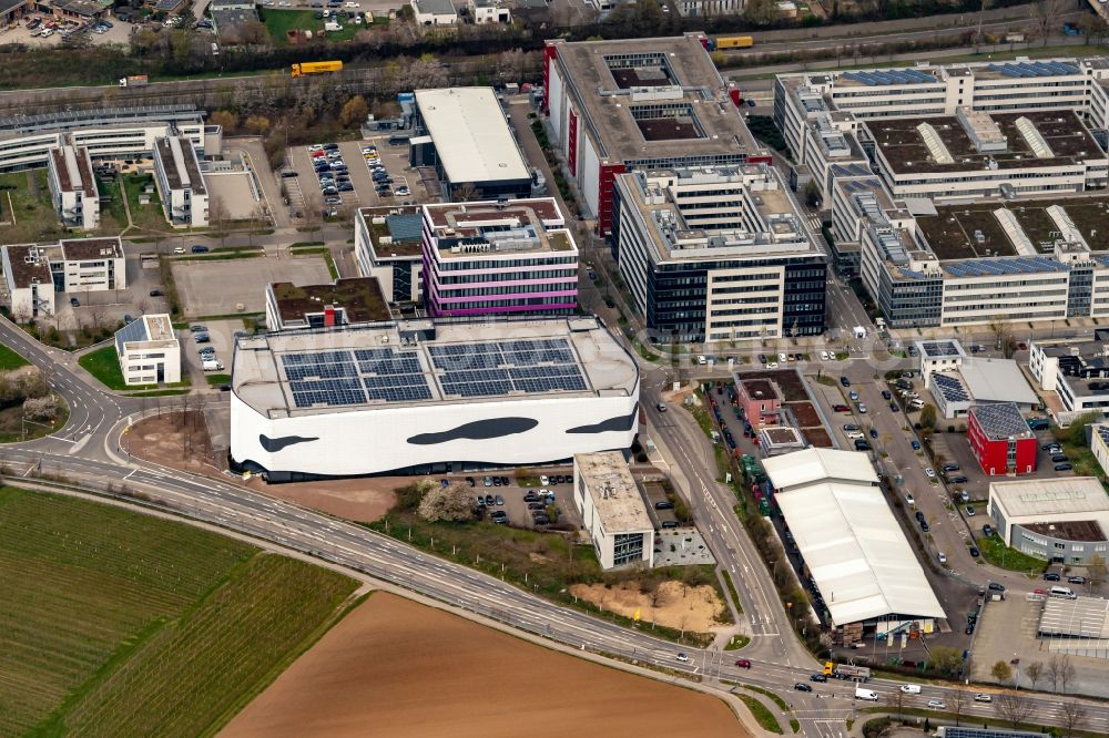 Aerial photograph Neckarsulm - Parking deck on the building of the car park Parkhaus Schwarz-Gruppe on street Friedrich-Gauss-Strasse in Neckarsulm in the state Baden-Wuerttemberg, Germany