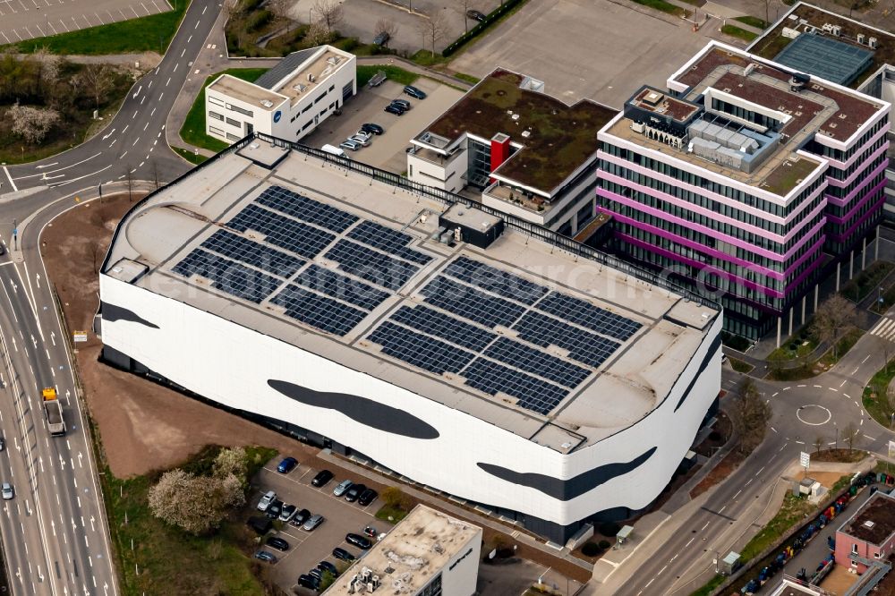 Neckarsulm from above - Parking deck on the building of the car park Parkhaus Schwarz-Gruppe on street Friedrich-Gauss-Strasse in Neckarsulm in the state Baden-Wuerttemberg, Germany