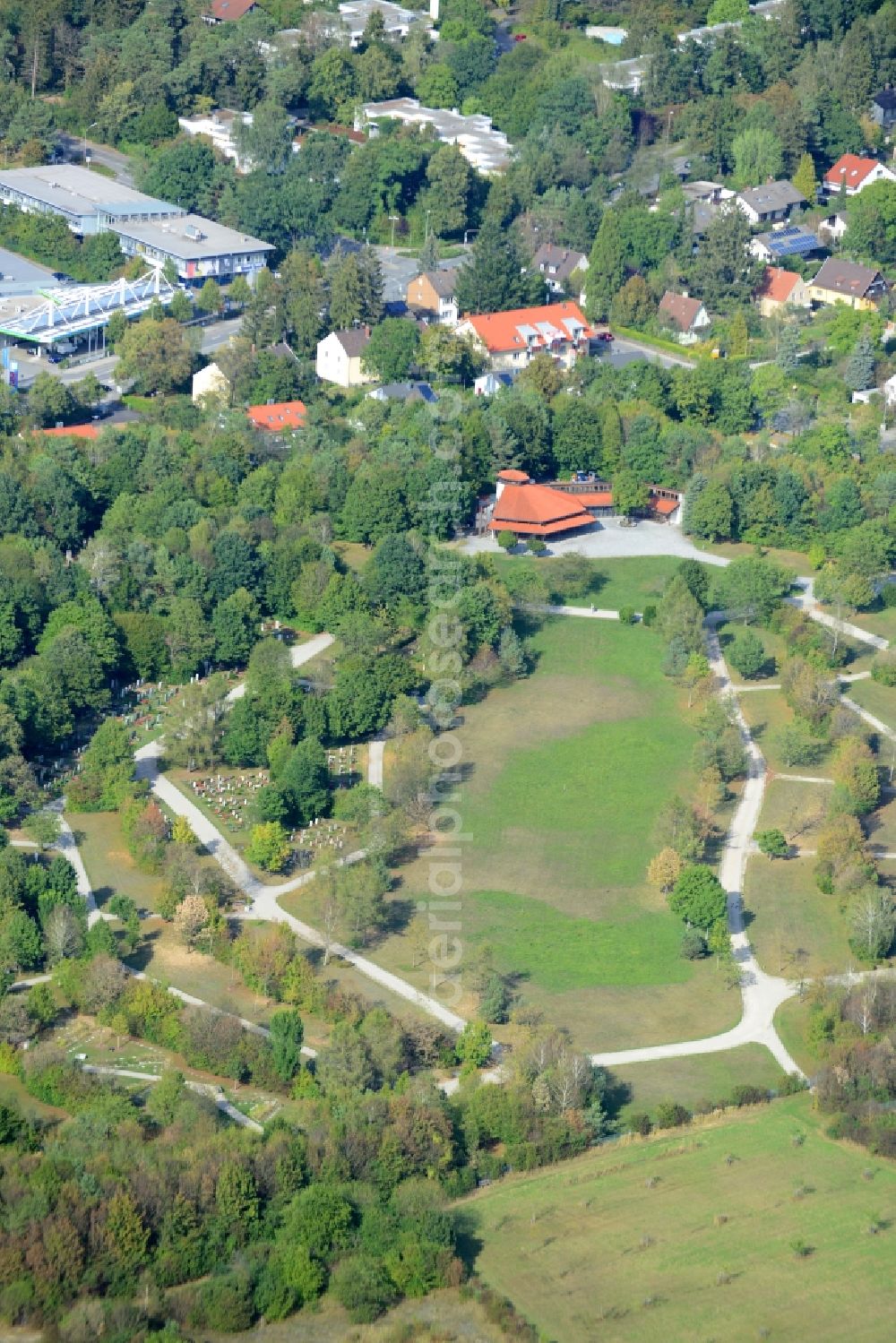 Aerial image Ottobrunn - Park Cemetery Parkfriedhof in Ottobrunn in the state of Bavaria. The circular cemetery is wooded and located in the West of Ottobrunn