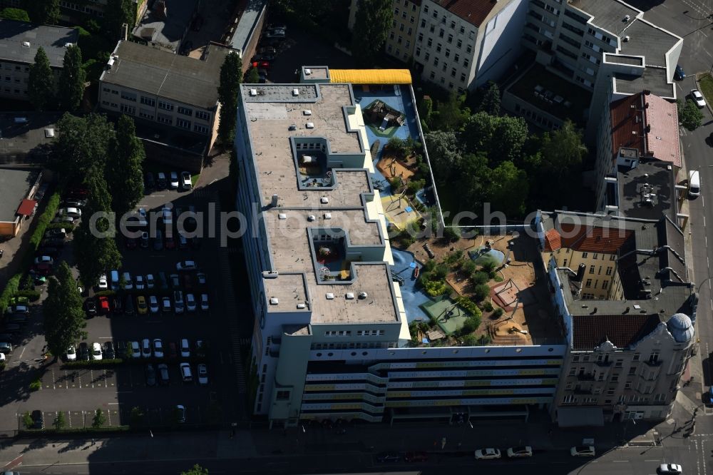 Aerial image Berlin - Parking garage building KITA Daycare - Nursery Bayer Pharma AG Muellerstrasse the Wedding district of Berlin