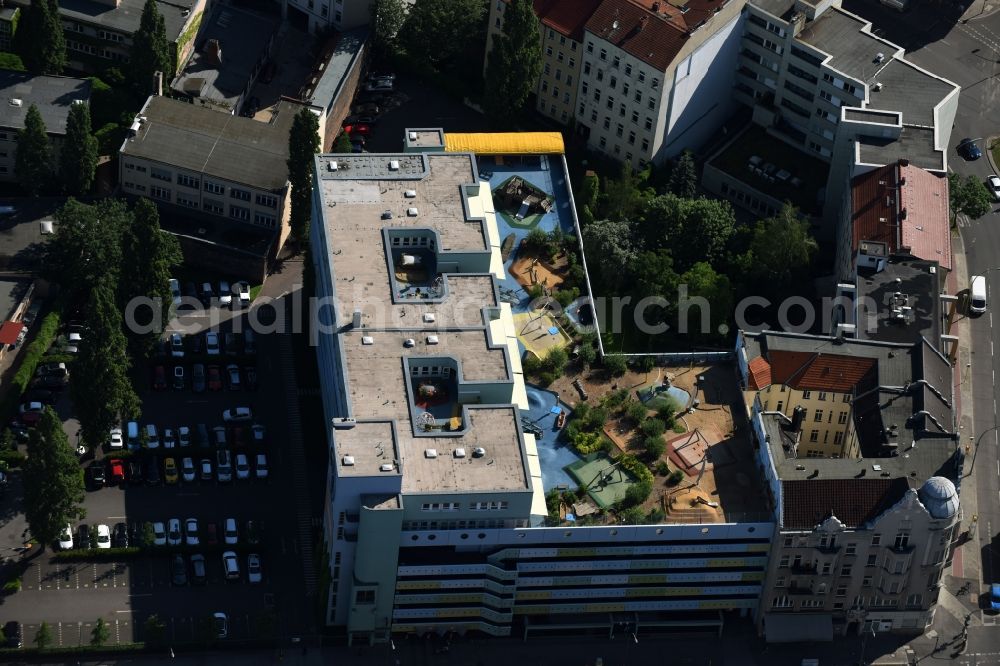 Berlin from above - Parking garage building KITA Daycare - Nursery Bayer Pharma AG Muellerstrasse the Wedding district of Berlin