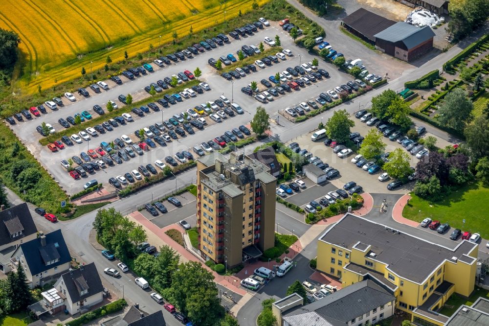 Arnsberg from the bird's eye view: Parking and storage space for automobiles on Stolte Ley in Arnsberg in the state North Rhine-Westphalia, Germany