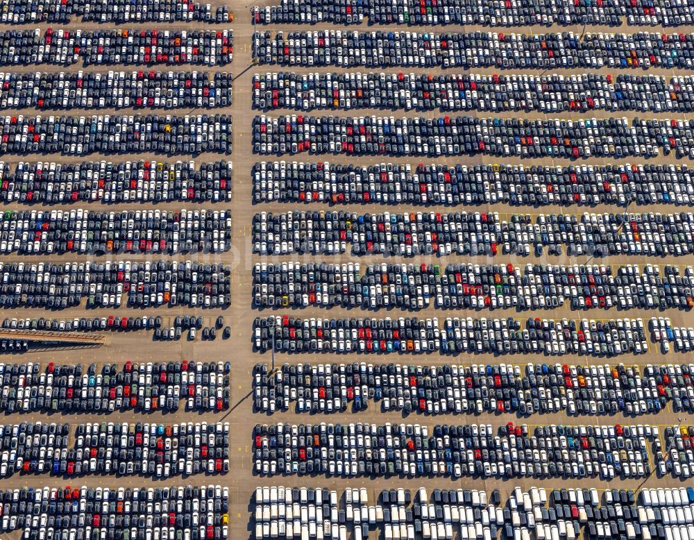 Duisburg from the bird's eye view: Parking lot and parking space for automobiles - passenger cars of the BLG AutoTerminal Deutschland GmbH & Co KG in the district Rheinhausen in Duisburg in the Ruhr area in the state North Rhine-Westphalia, Germany