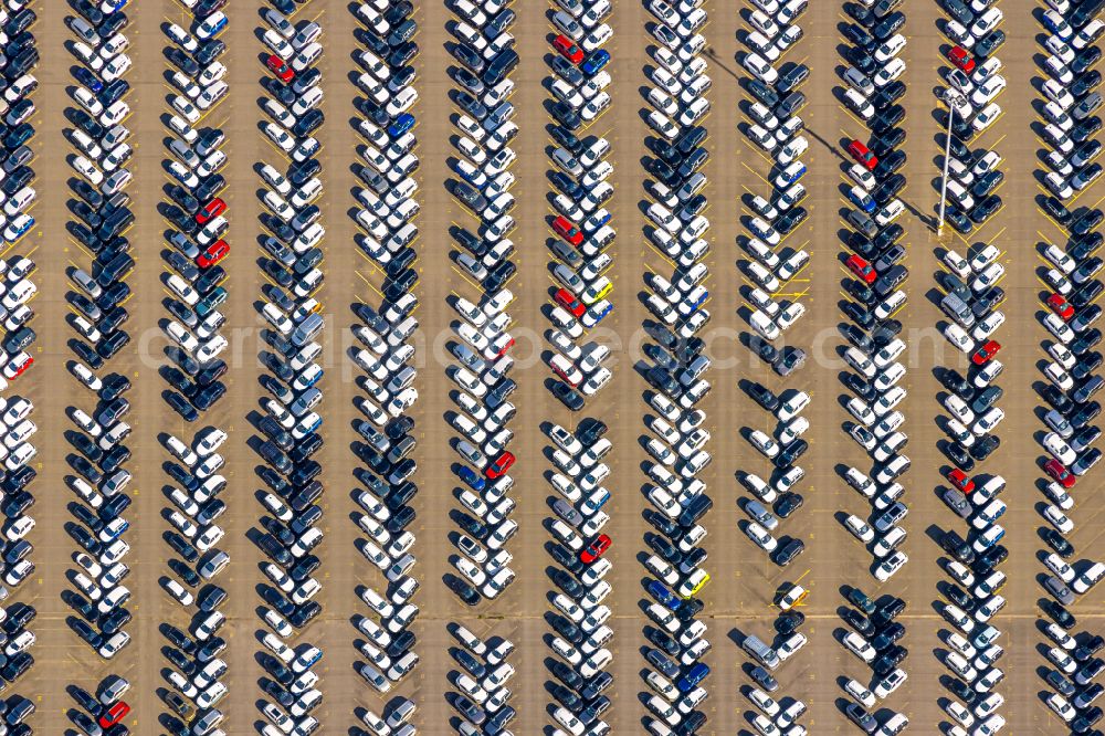 Duisburg from above - Parking lot and parking space for automobiles - passenger cars of the BLG AutoTerminal Deutschland GmbH & Co KG in the district Rheinhausen in Duisburg in the Ruhr area in the state North Rhine-Westphalia, Germany