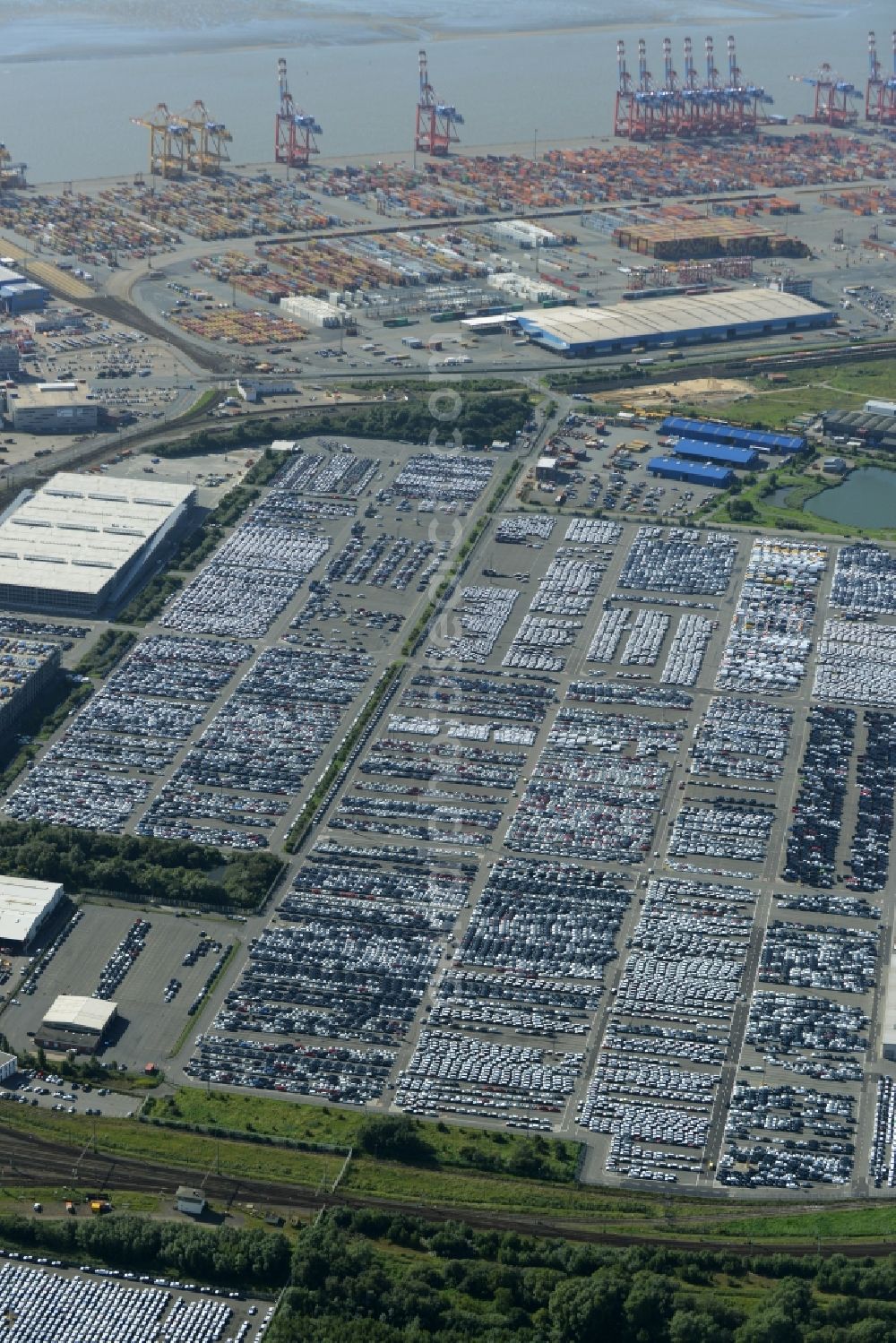 Bremerhaven from the bird's eye view: Parking and storage space for automobiles at the international port in Bremerhaven in the state Bremen