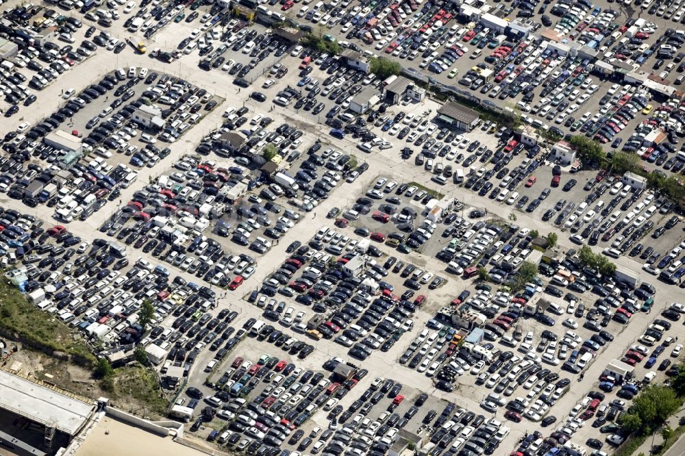 Berlin from above - Parking and storage space for automobiles of the export car dealership and commercial area on Koepenicker Landstrasse in Berlin in Berlin, Germany