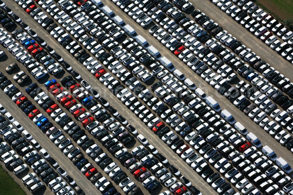 Möhlin from the bird's eye view: Parking and storage space for new automobil and vans on the factory premises of a logistics company in Moehlin in Switzerland