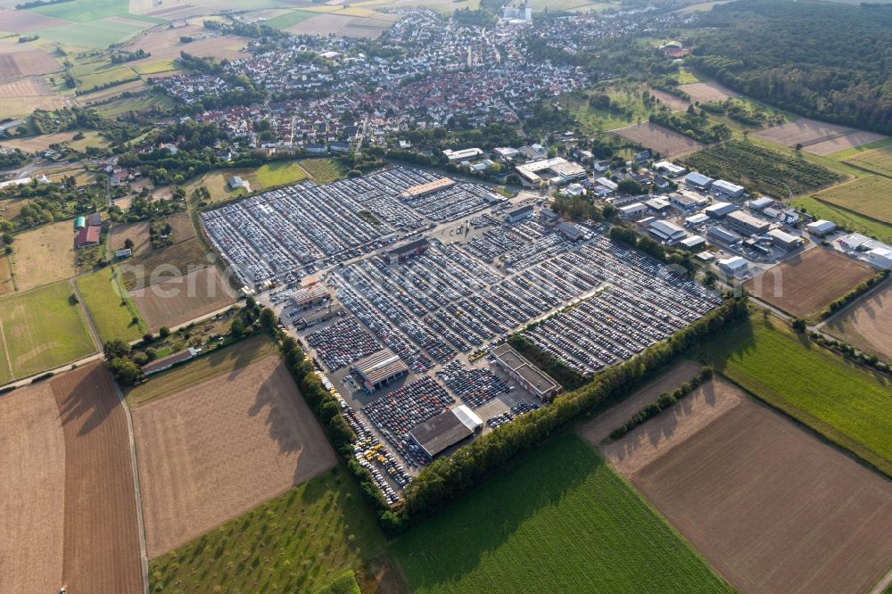 Schöneck from above - Parking and storage space for automobiles of AUTOKONTOR BAYERN GmbH in the district Kilianstaedten in Schoeneck in the state Hesse, Germany