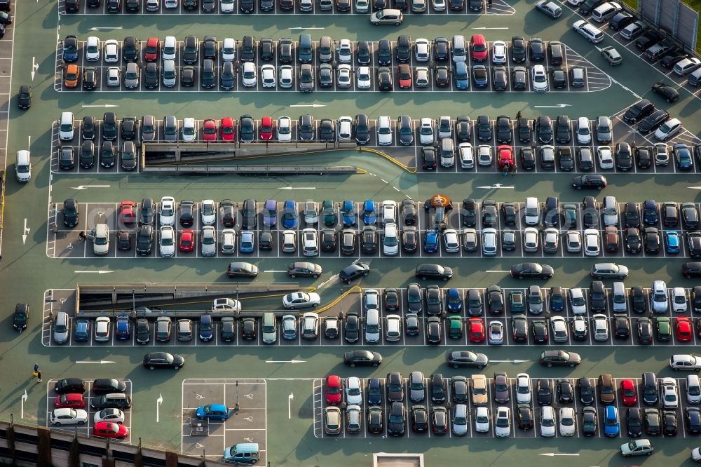 Oberhausen from the bird's eye view: Parking and storage space for cars at the CentrO shopping mall in Oberhausen in the state of North Rhine-Westphalia