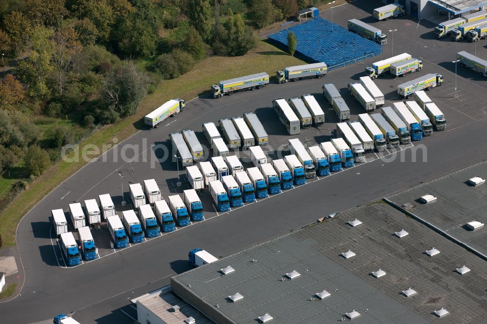 Aerial image Meckenheim - View of the truck parking in front of the EDEKA warehouse in Meckenheim in North Rhine-Westphalia. The camp pimarily serves as a logistics center