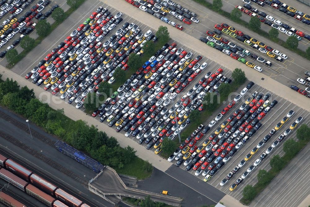 Aerial image Eisenach - On the premises of Adam Opel AG in Eisenach in Thuringia on a parking fully assembled cars of the brands Corsa and Adam for delivery. Right next to the parking lot are the Deutsche Bahn railway siding for the transportation of vehicles