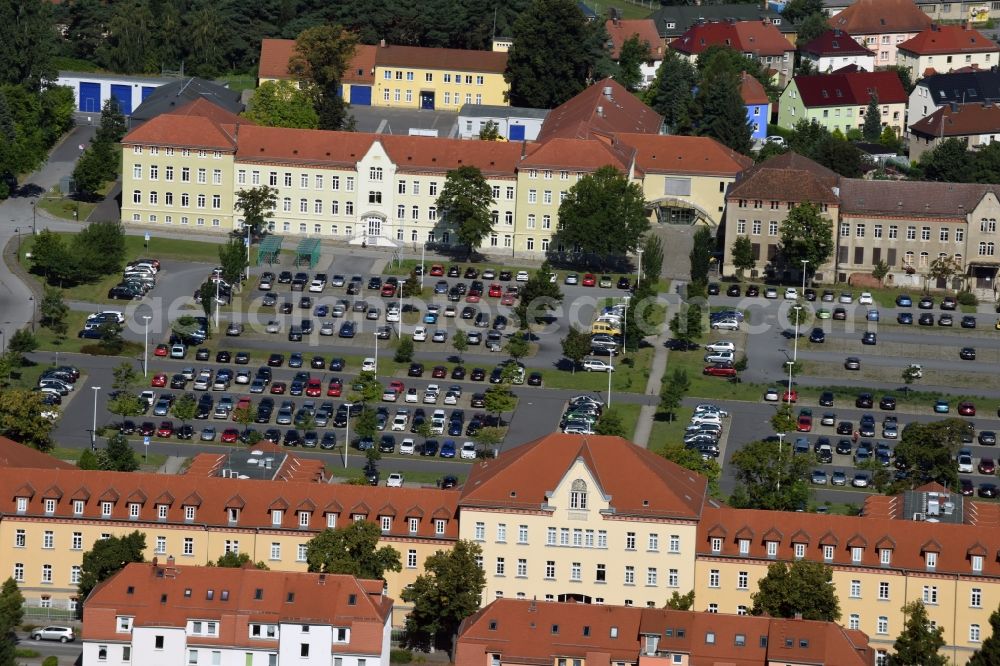 Aerial image Kamenz - Parking lot and administration buildings on Garnisonsplatz square in Kamenz in the state of Saxony