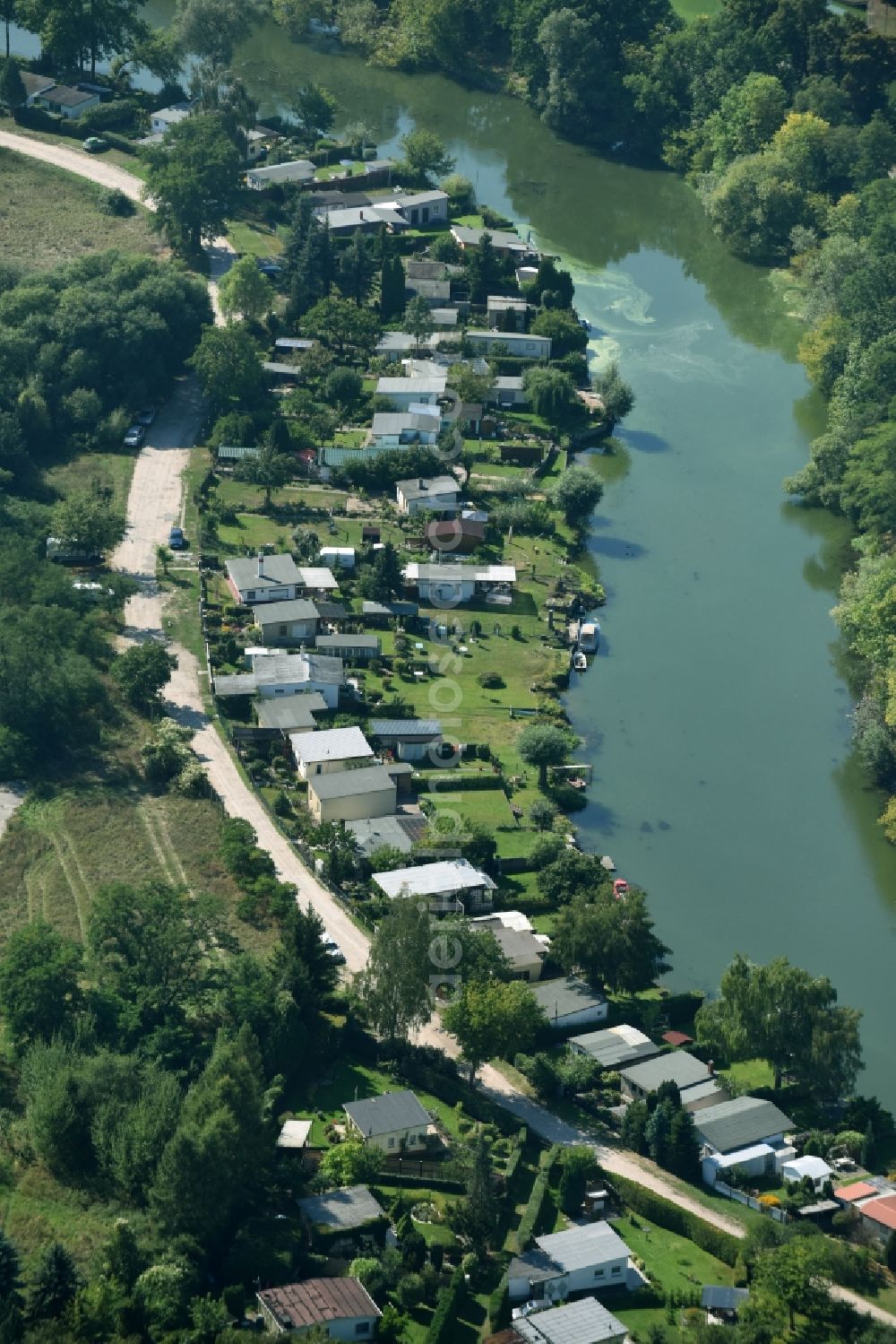 Rathenow from above - Parcel of a small garden along the river course of Grosse Archen in Rathenow in the state Brandenburg