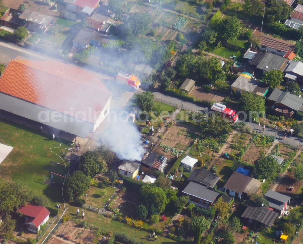 Göttingen from above - Parcel of a small garden with fire smoke clouds in Goettingen in the state Lower Saxony