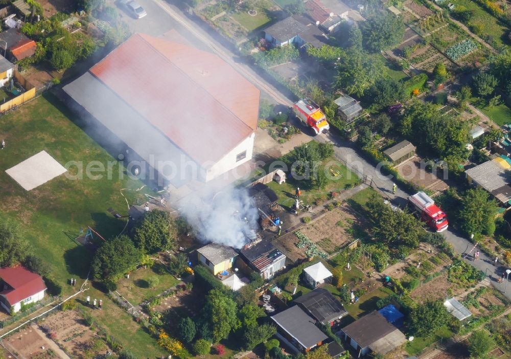 Aerial image Göttingen - Parcel of a small garden with fire smoke clouds in Goettingen in the state Lower Saxony