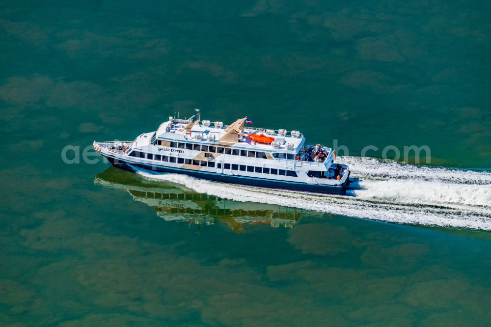 Aerial image Nordstrand - Passenger ship Adler Express at full speed near the peninsula Nordstrand in the Wadden Sea in the state Schleswig-Holstein, Germany