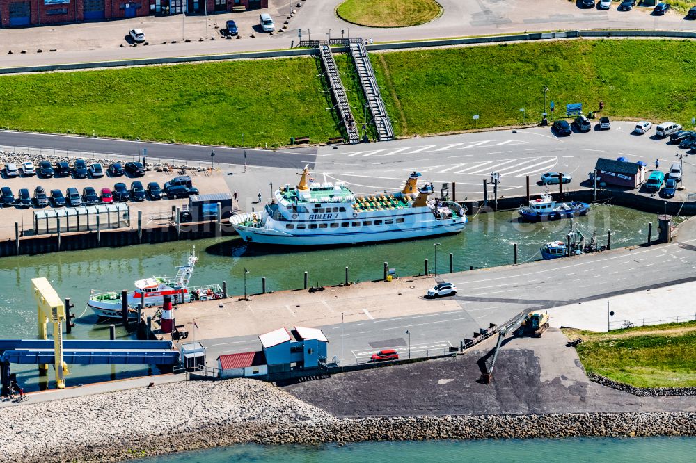 Aerial photograph Nordstrand - Passenger ship Adler V shipping company Ader Schiffe in the harbor in Nordstrand Nordfriesland in the state Schleswig-Holstein, Germany