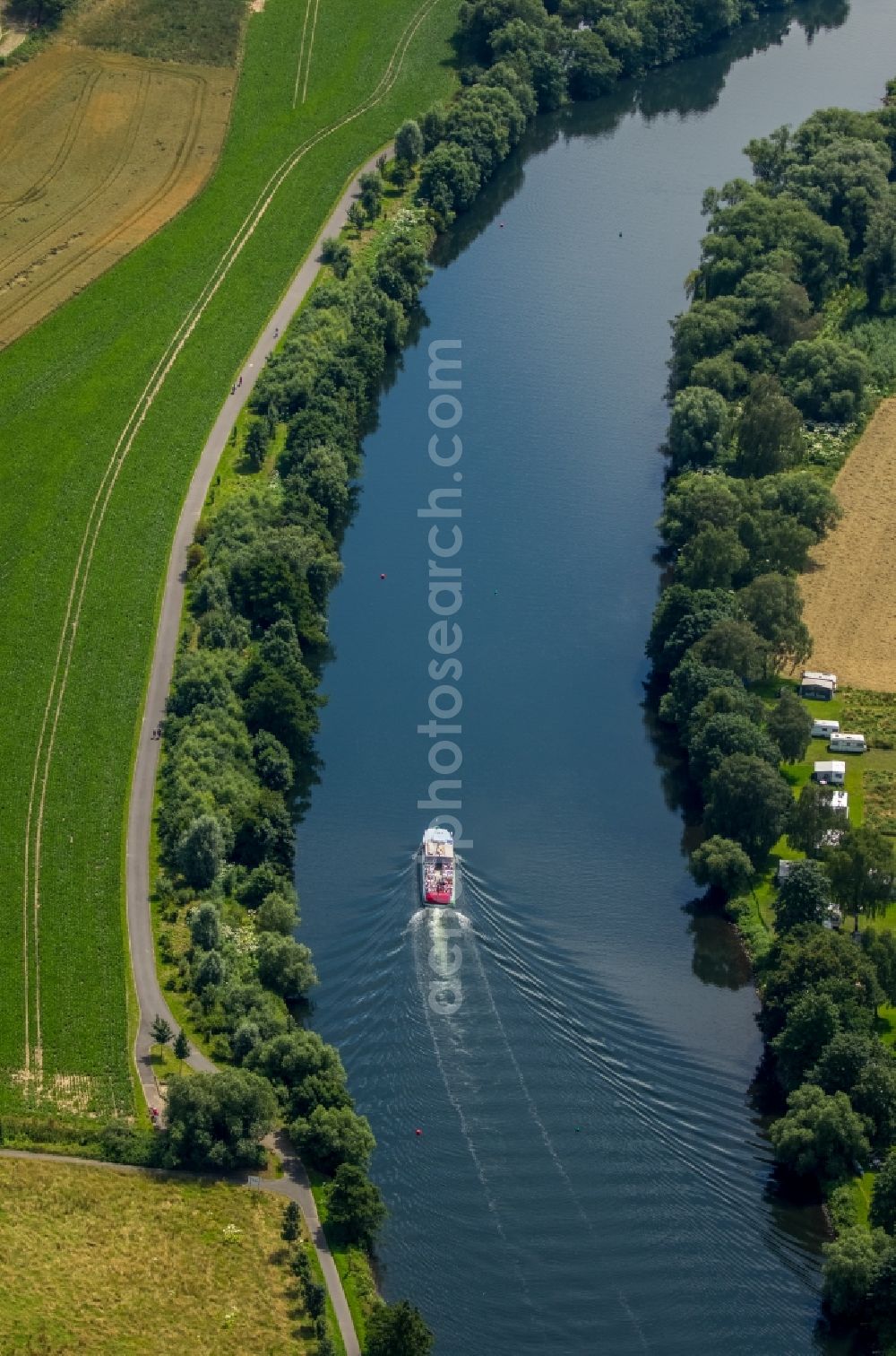 Mülheim an der Ruhr from the bird's eye view: Passenger ship in trip on the course of the river of the Ruhr in Muelheim on the Ruhr in the state North Rhine-Westphalia