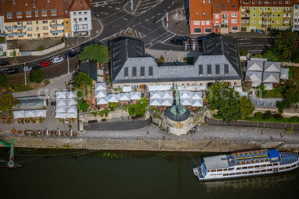 Würzburg from the bird's eye view: Passenger ship in front of the gastronomy - restaurant - building with the Brauerei-Gasthof Alter Kranen in the district Altstadt in Wuerzburg in the state Bavaria, Germany