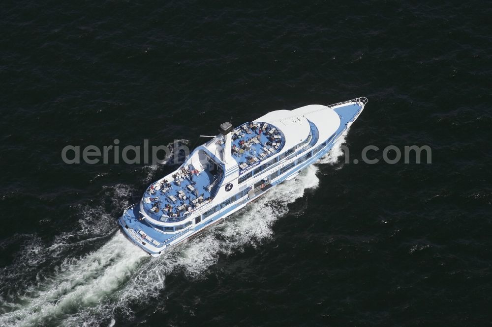 Aerial photograph Strande - Passenger ship MS. HAMBURG in Strande in the state Schleswig-Holstein. The motor vessel is the official escort ship for viewers of Kieler Woche