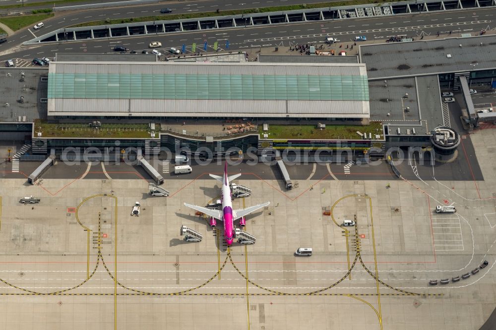 Holzwickede from above - Passenger airplane Airbus A320 in parking position - parking area at the airport in Holzwickede in the state North Rhine-Westphalia, Germany