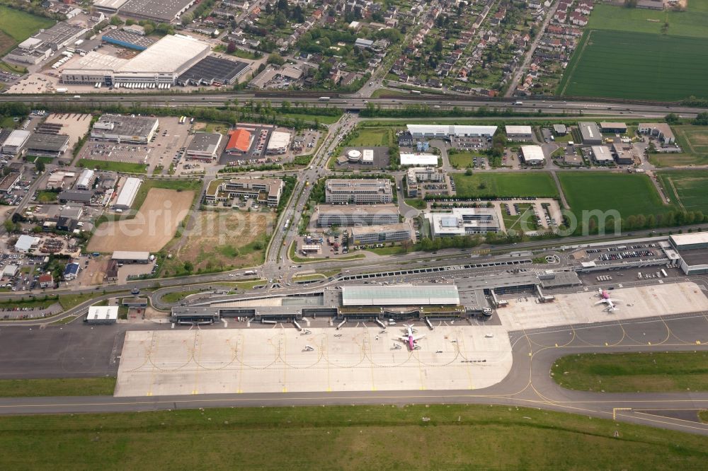 Holzwickede from the bird's eye view: Passenger airplane Airbus A320 in parking position - parking area at the airport in Holzwickede in the state North Rhine-Westphalia, Germany