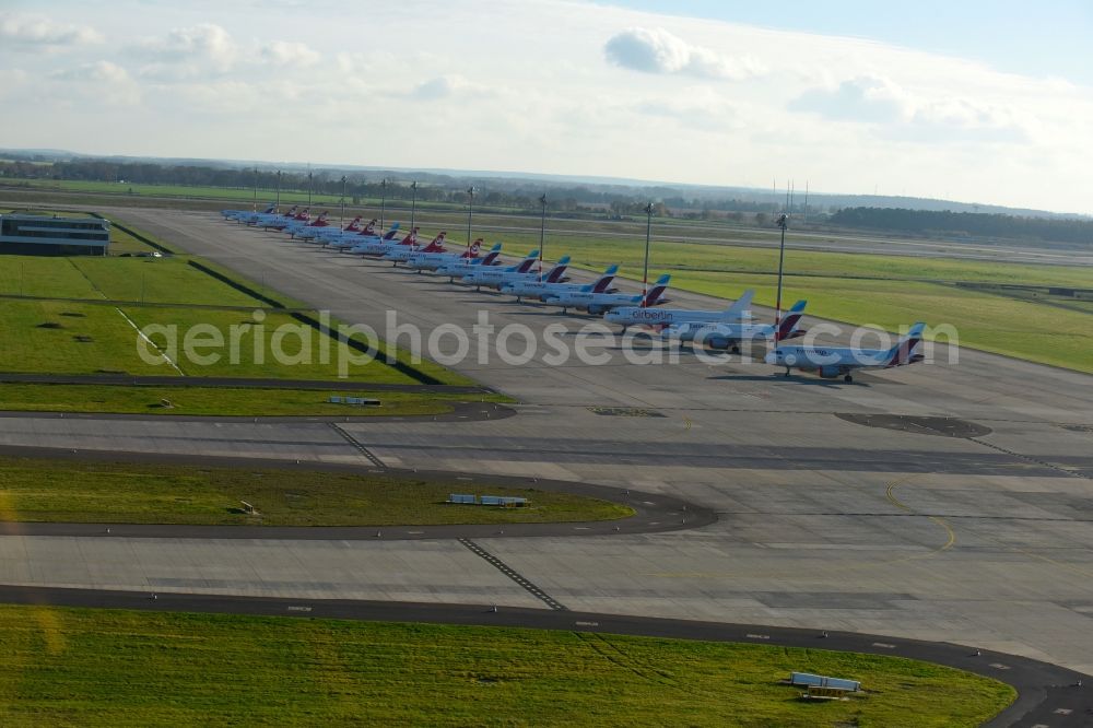 Aerial photograph Schönefeld - Airliner- Passenger aircraft AIRBUS A319 - 320 of insolvent airline airberlin on the apron of the airport BER in Schoenefeld in the state Brandenburg, Germany