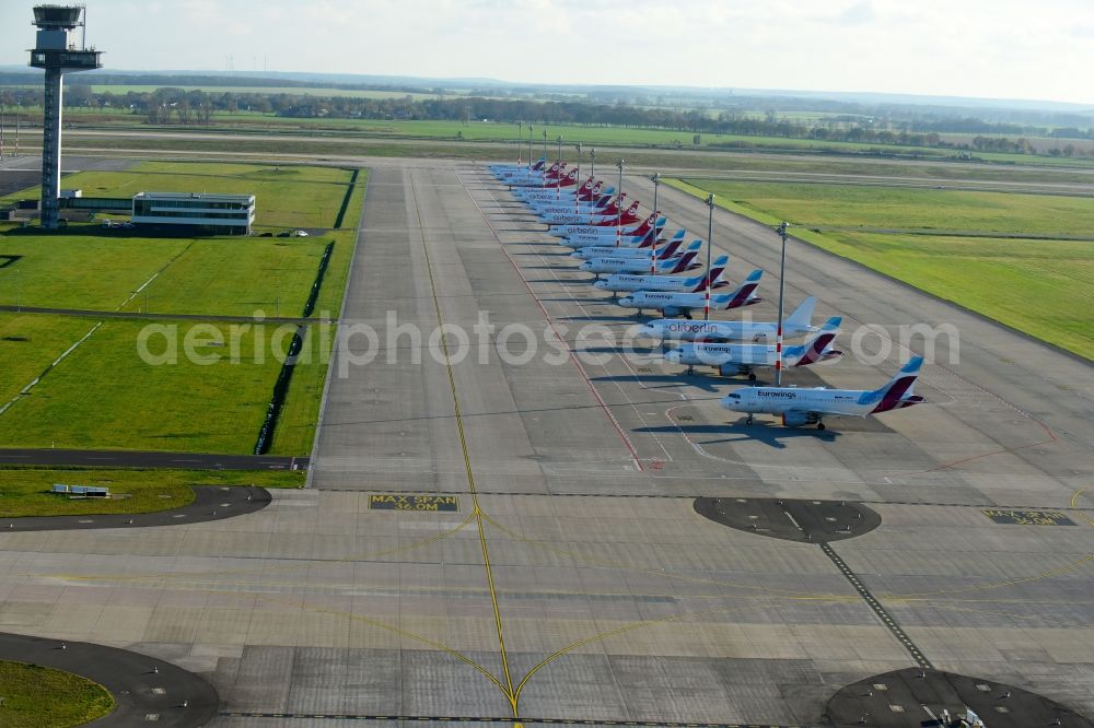 Schönefeld from above - Airliner- Passenger aircraft AIRBUS A319 - 320 of insolvent airline airberlin on the apron of the airport BER in Schoenefeld in the state Brandenburg, Germany