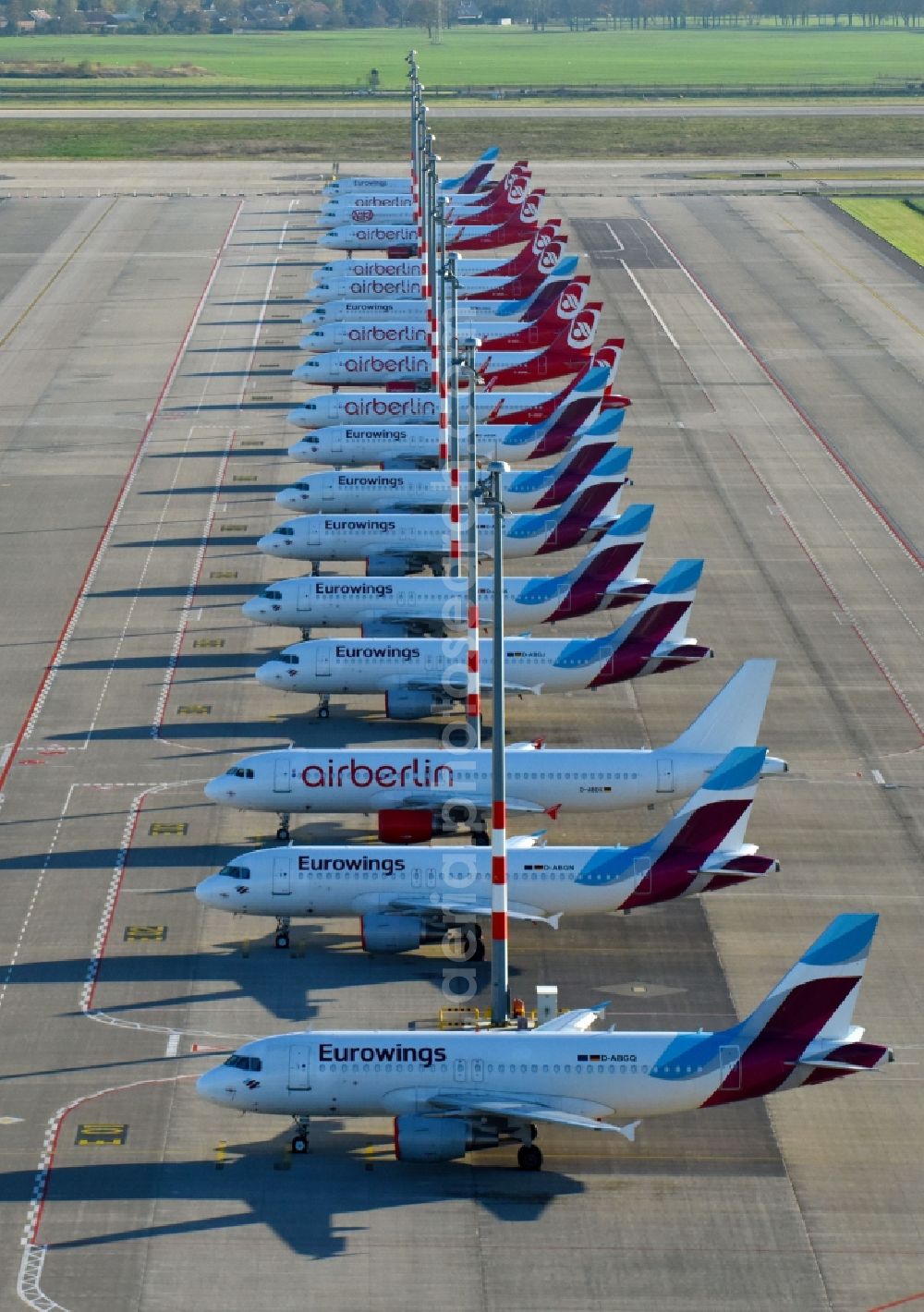 Aerial photograph Schönefeld - Airliner- Passenger aircraft AIRBUS A319 - 320 of insolvent airline airberlin on the apron of the airport BER in Schoenefeld in the state Brandenburg, Germany