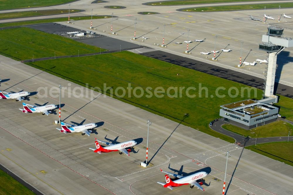 Schönefeld from the bird's eye view: Airliner- Passenger aircraft AIRBUS A319 - 320 of insolvent airline airberlin on the apron of the airport BER in Schoenefeld in the state Brandenburg, Germany