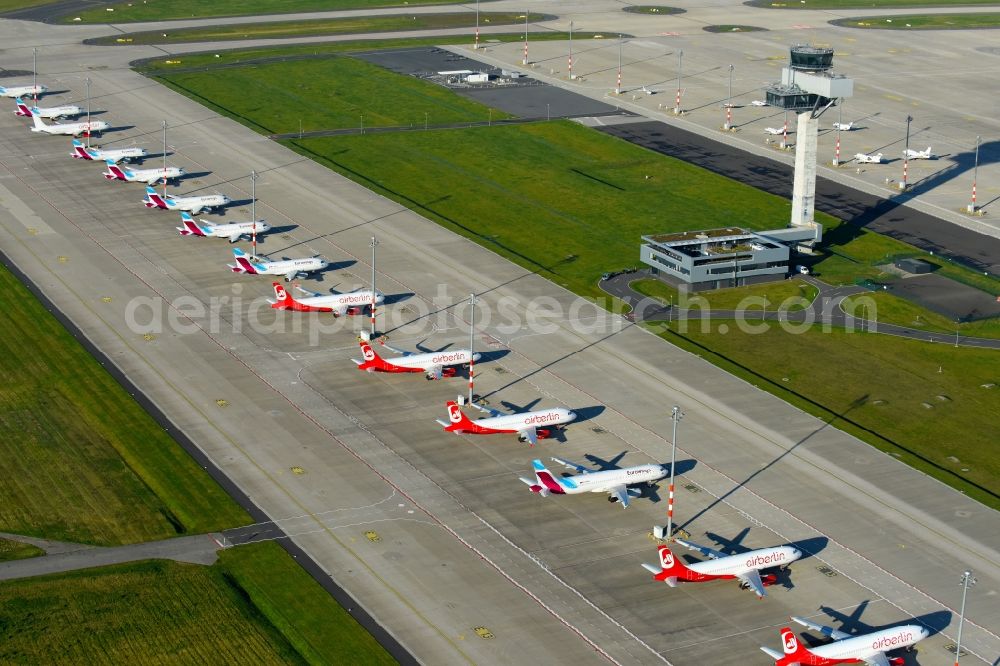 Aerial photograph Schönefeld - Airliner- Passenger aircraft AIRBUS A319 - 320 of insolvent airline airberlin on the apron of the airport BER in Schoenefeld in the state Brandenburg, Germany