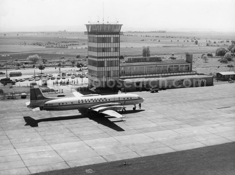 Aerial photograph Erfurt - Commercial Aircraft Ilyushin IL-18 East German airline INTERFLUG with the identifier DM-STK before the tower of the airport Erfurt- Bindesleben in Thuringia