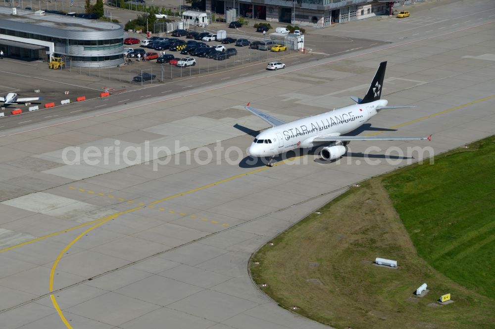 Stuttgart from above - Airliner- Passenger aircraft TC-JPF - Airbus A320-232 - Turkish Airlines Star Alliance Livery rolling on the apron of the airport in Stuttgart in the state Baden-Wuerttemberg