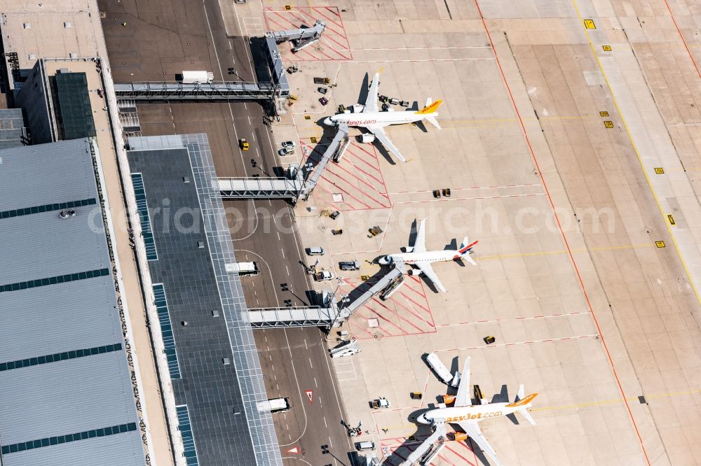 Aerial photograph Stuttgart - Passenger airplane in parking position - parking area at the airport in Stuttgart in the state Baden-Wurttemberg, Germany