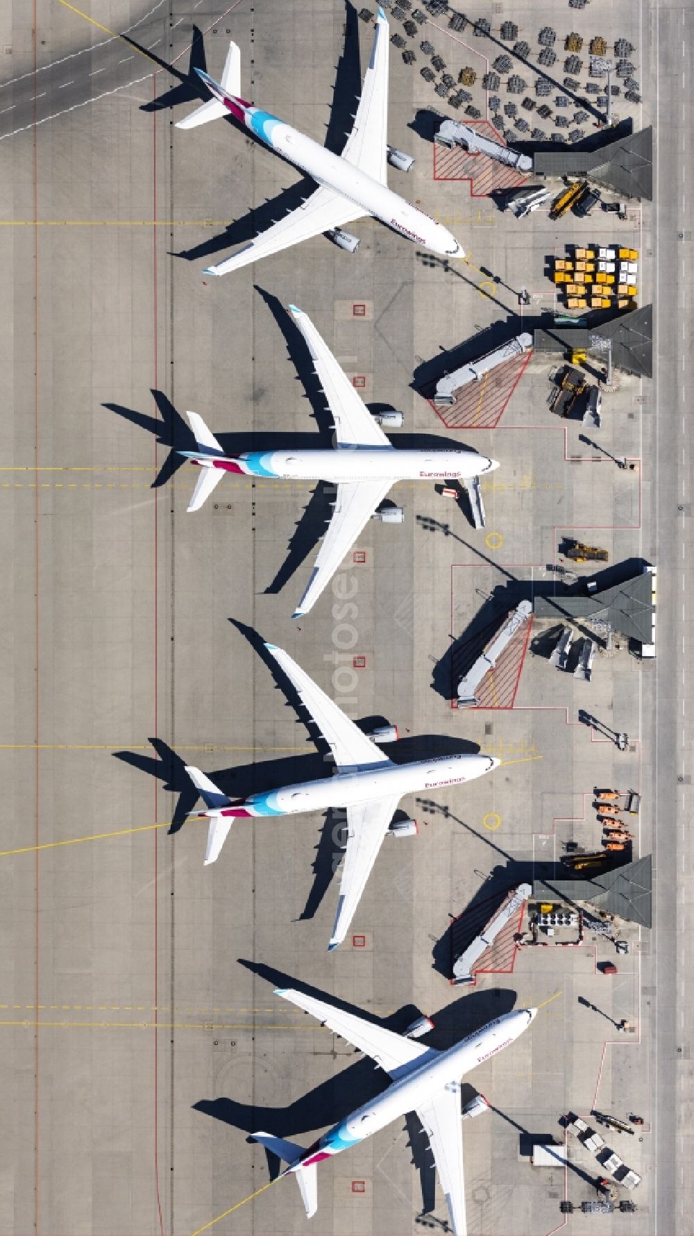 München-Flughafen from the bird's eye view: Passenger airplane of Eurowings Langstreckenflotte in parking position - parking area at the airport in Muenchen-Flughafen in the state Bavaria, Germany