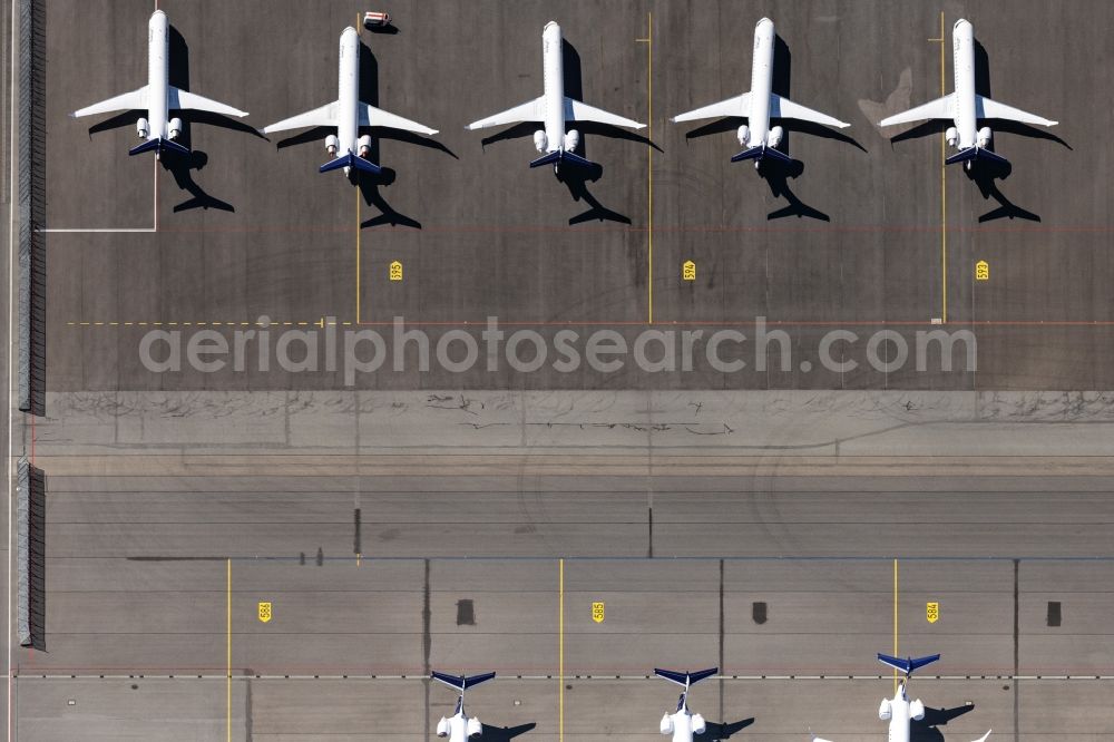 Aerial image München-Flughafen - Passenger airplane of Lufthansa, aufgrund of Corona Lockdowns in parking position - parking area at the airport in Muenchen-Flughafen in the state Bavaria, Germany