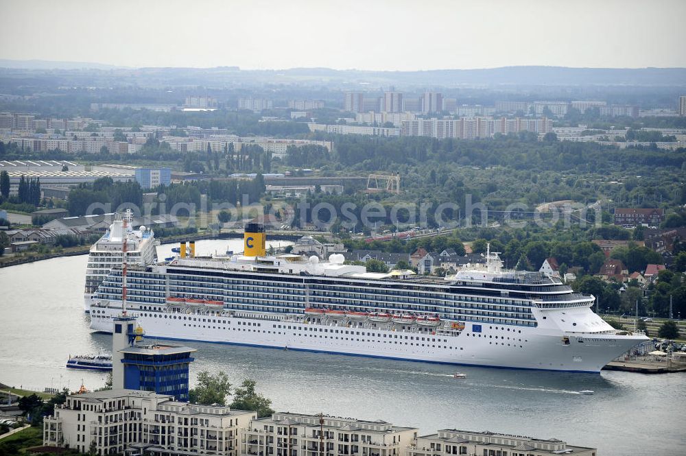 Rostock - Warnemünde from above - Blick auf den Kreuzfahrt - Hafen in Warnemünde mit dem Passagierschiff COSTA ATLANTICA . Die Costa Atlantica ist ein Kreuzfahrtschiff der Reederei Costa Crociere. Das Einsatzgebiet des 290m langen Luxusliners ist im Sommer das Nordland und die Ostsee. View of the Cruise - Port of Rostock - Warnemünde with the passenger ship COSTA ATLANTICA. The Costa Atlantica is a cruise ship for Costa Crociere.