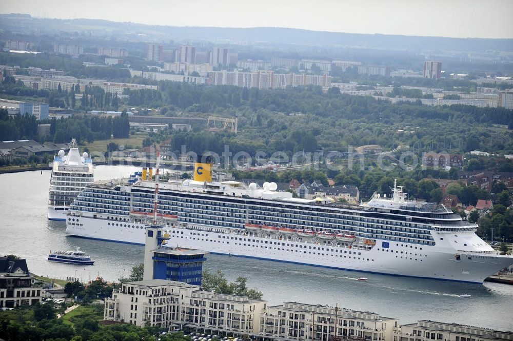 Rostock - Warnemünde from the bird's eye view: Blick auf den Kreuzfahrt - Hafen in Warnemünde mit dem Passagierschiff COSTA ATLANTICA . Die Costa Atlantica ist ein Kreuzfahrtschiff der Reederei Costa Crociere. Das Einsatzgebiet des 290m langen Luxusliners ist im Sommer das Nordland und die Ostsee. View of the Cruise - Port of Rostock - Warnemünde with the passenger ship COSTA ATLANTICA. The Costa Atlantica is a cruise ship for Costa Crociere.