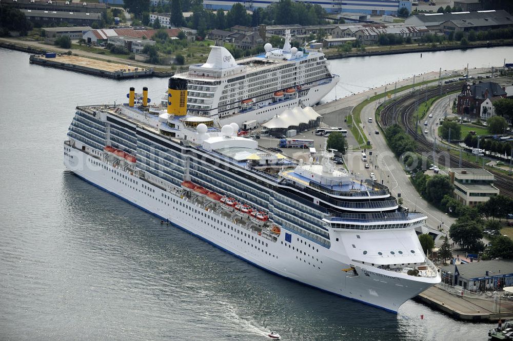 Aerial image Rostock - Warnemünde - Blick auf den Kreuzfahrt - Hafen in Warnemünde mit dem Passagierschiff COSTA ATLANTICA . Die Costa Atlantica ist ein Kreuzfahrtschiff der Reederei Costa Crociere. Das Einsatzgebiet des 290m langen Luxusliners ist im Sommer das Nordland und die Ostsee. View of the Cruise - Port of Rostock - Warnemünde with the passenger ship COSTA ATLANTICA. The Costa Atlantica is a cruise ship for Costa Crociere.